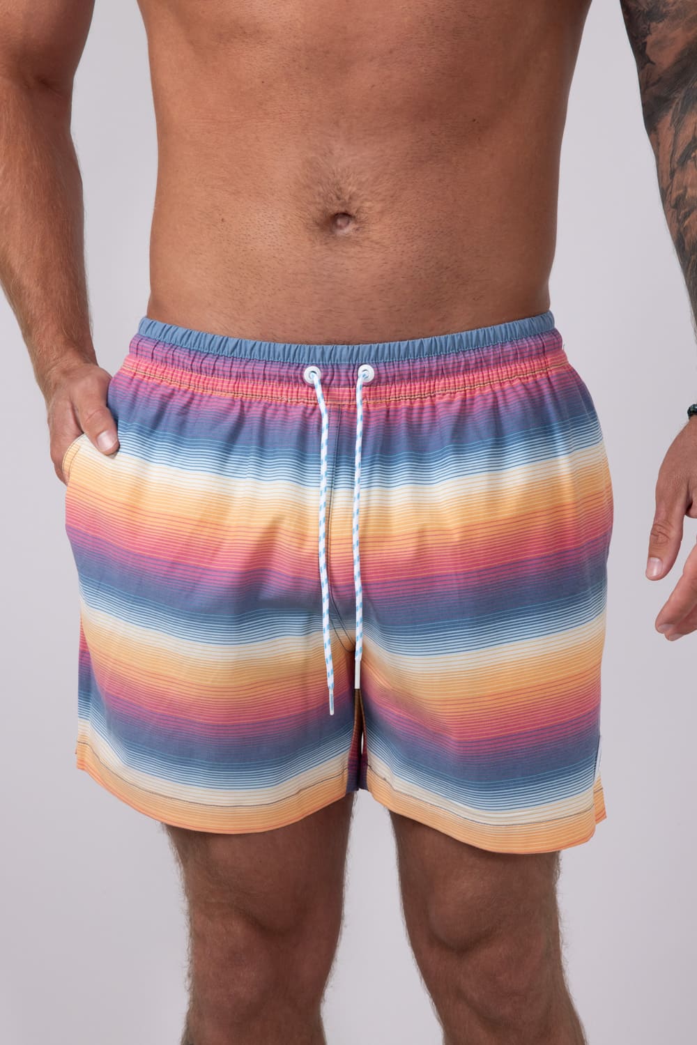 Chubbies Classic Lined Swim Trunks 5.5” Shorts for Men in Blue/Orange Gradient Stripe