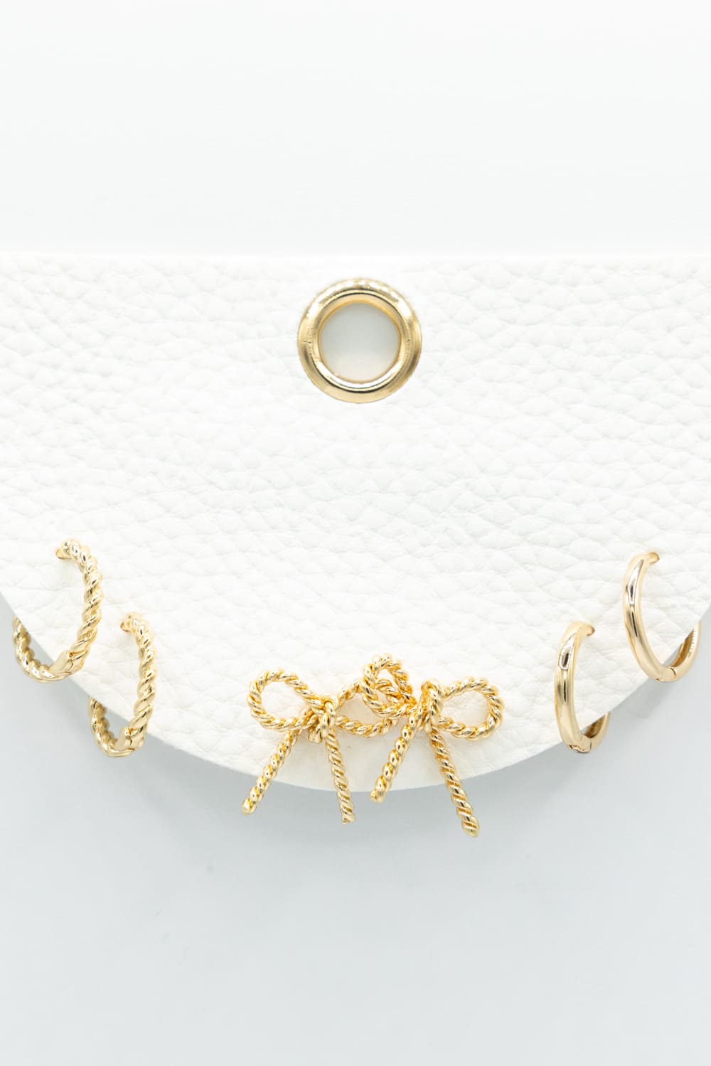 Three Pair Huggie Bow Earrings in Gold