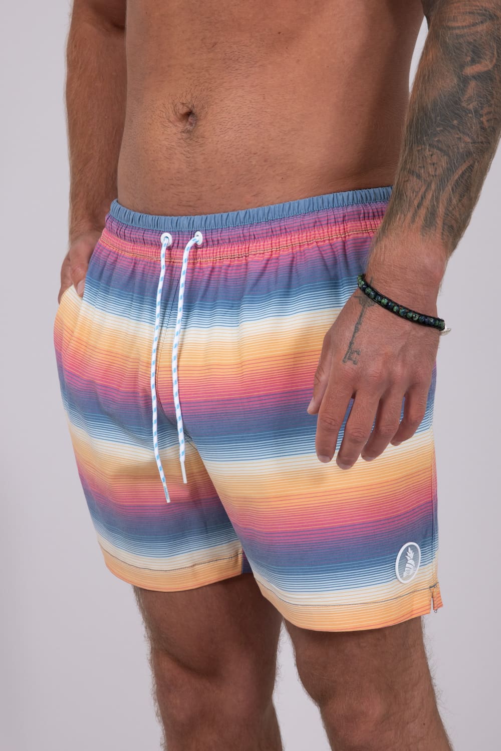 Chubbies Classic Lined Swim Trunks 5.5” Shorts for Men in Blue/Orange Gradient Stripe