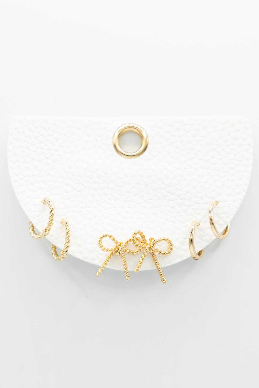 Three Pair Huggie Bow Earrings in Gold