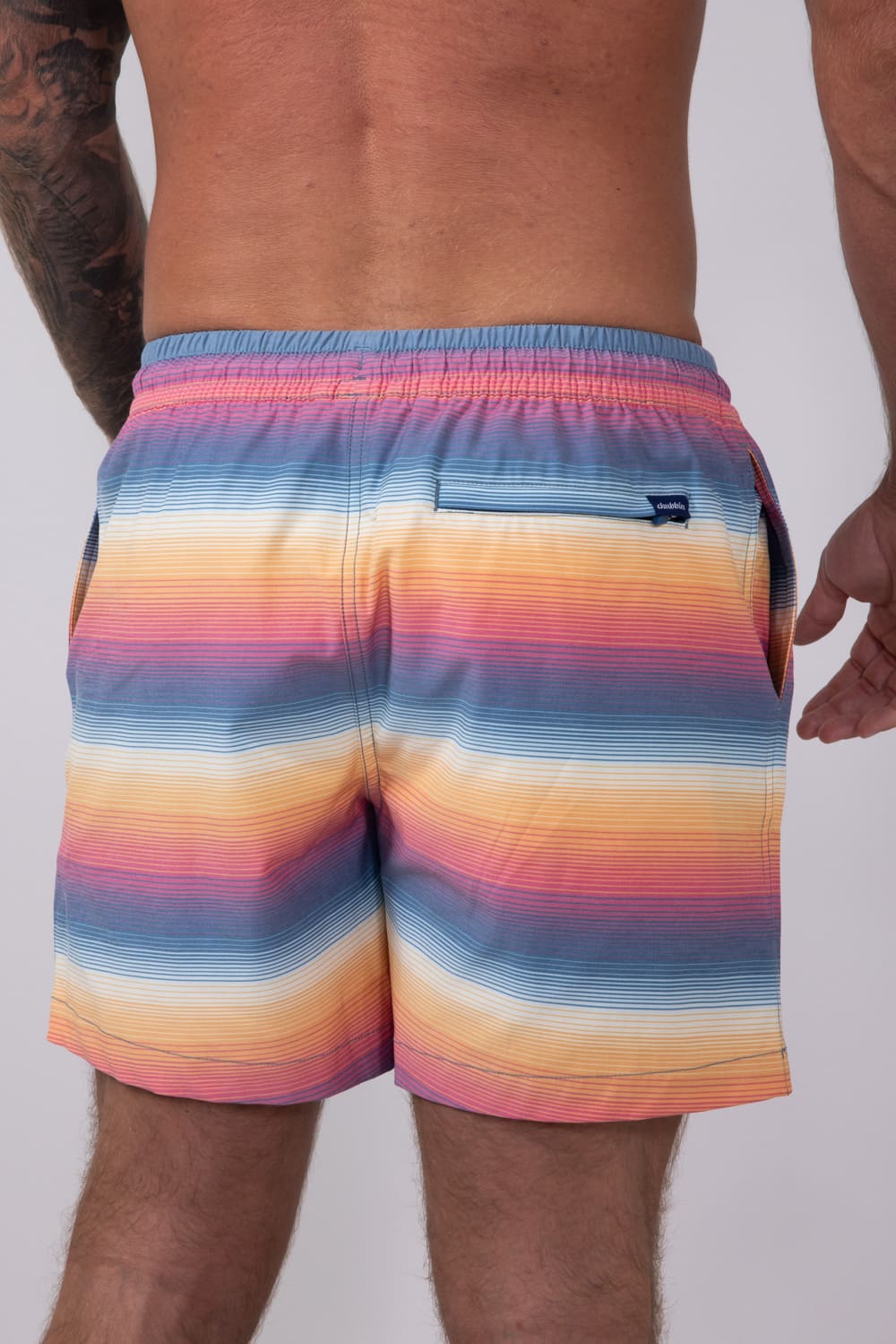 Chubbies Classic Lined Swim Trunks 5.5” Shorts for Men in Blue/Orange Gradient Stripe