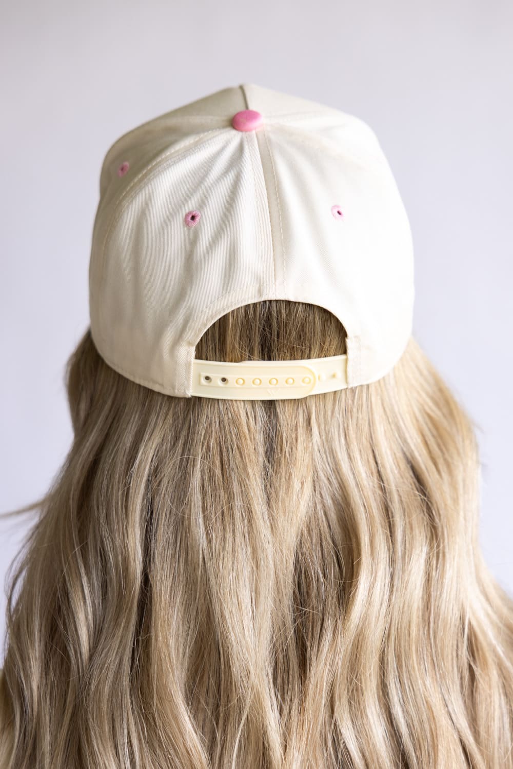 Put It On My Husband’s Tab Trucker Hat for Women in Pink/Tan