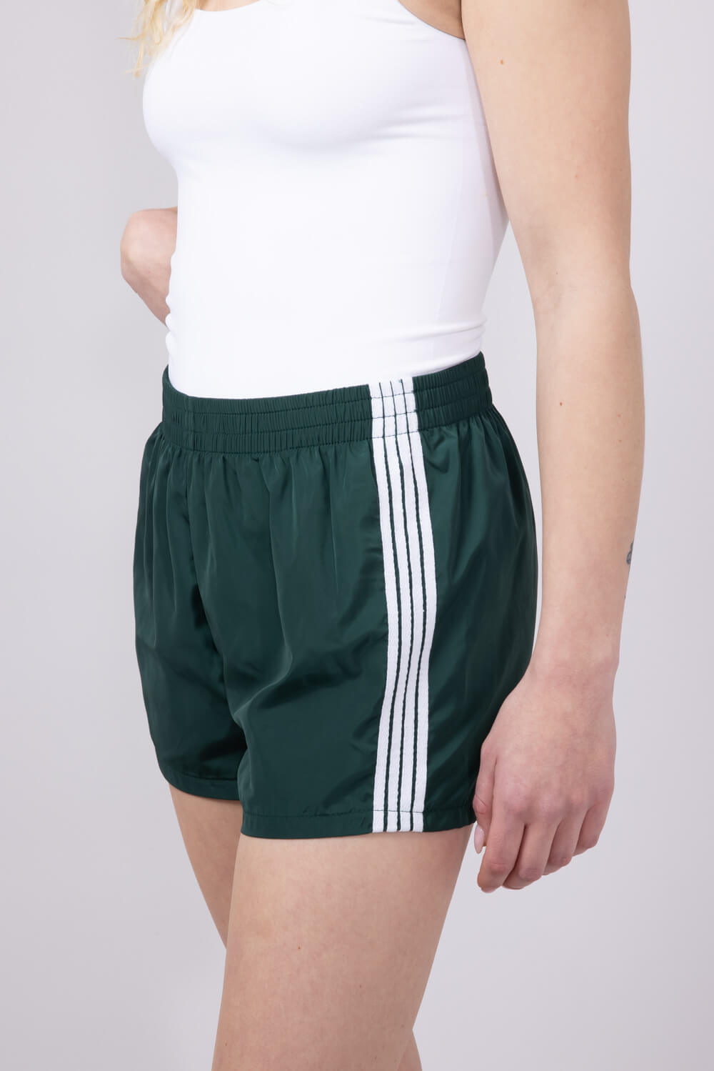 Essentials 4 Stripe Woven Track Shorts for Women in Vintage Green