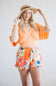Rokoko Bat Wing Open Back Top for Women in Orange