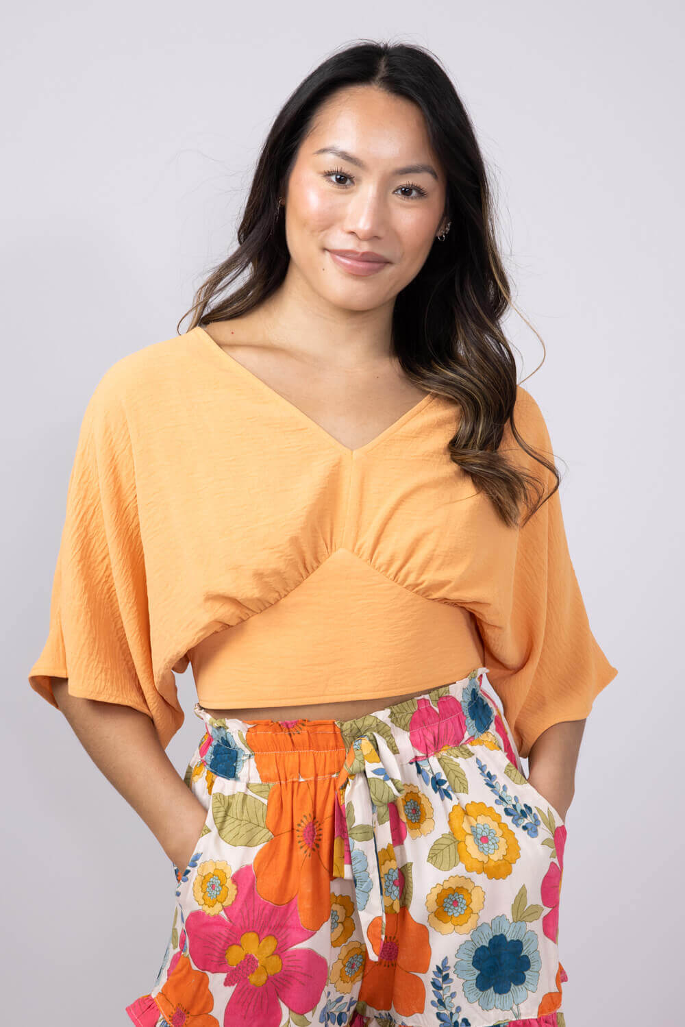 Rokoko Bat Wing Open Back Top for Women in Orange