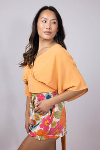 Rokoko Bat Wing Open Back Top for Women in Orange